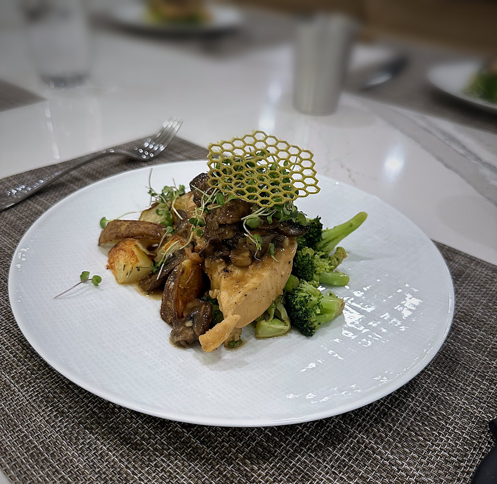 Chicken with wild mushrooms and a honeycomb tuile