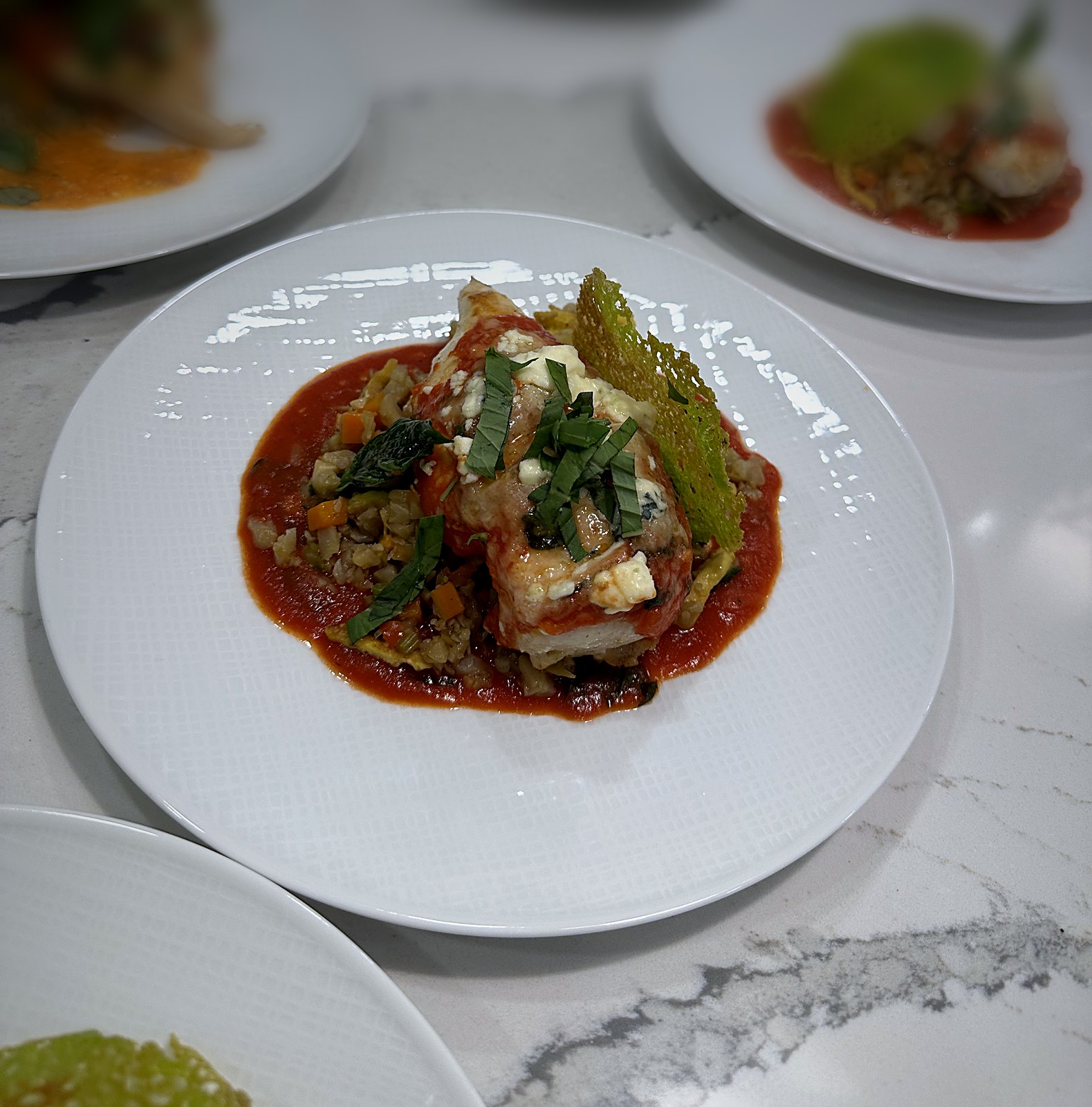 Fish in a roasted pepper sauce