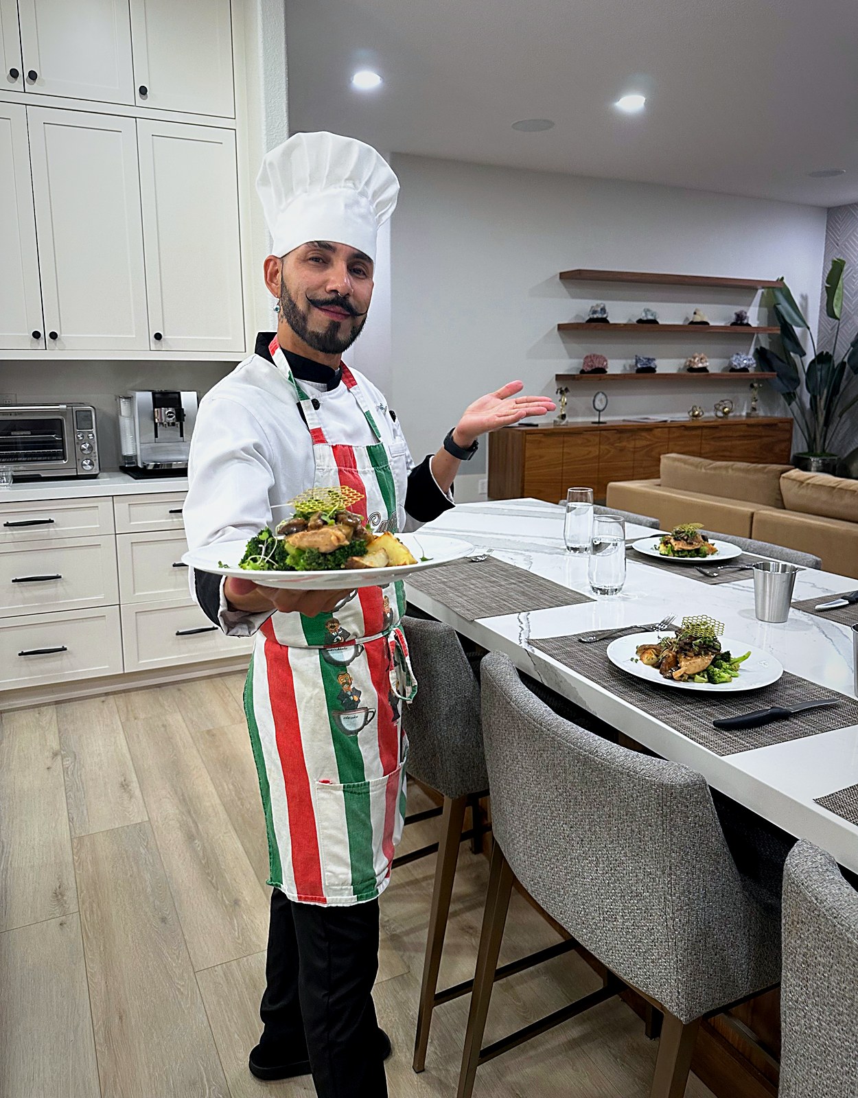 Presenting chicken with wild mushrooms at a private dinner