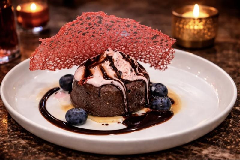 Chocolate lava cake with berry tuile and blueberries